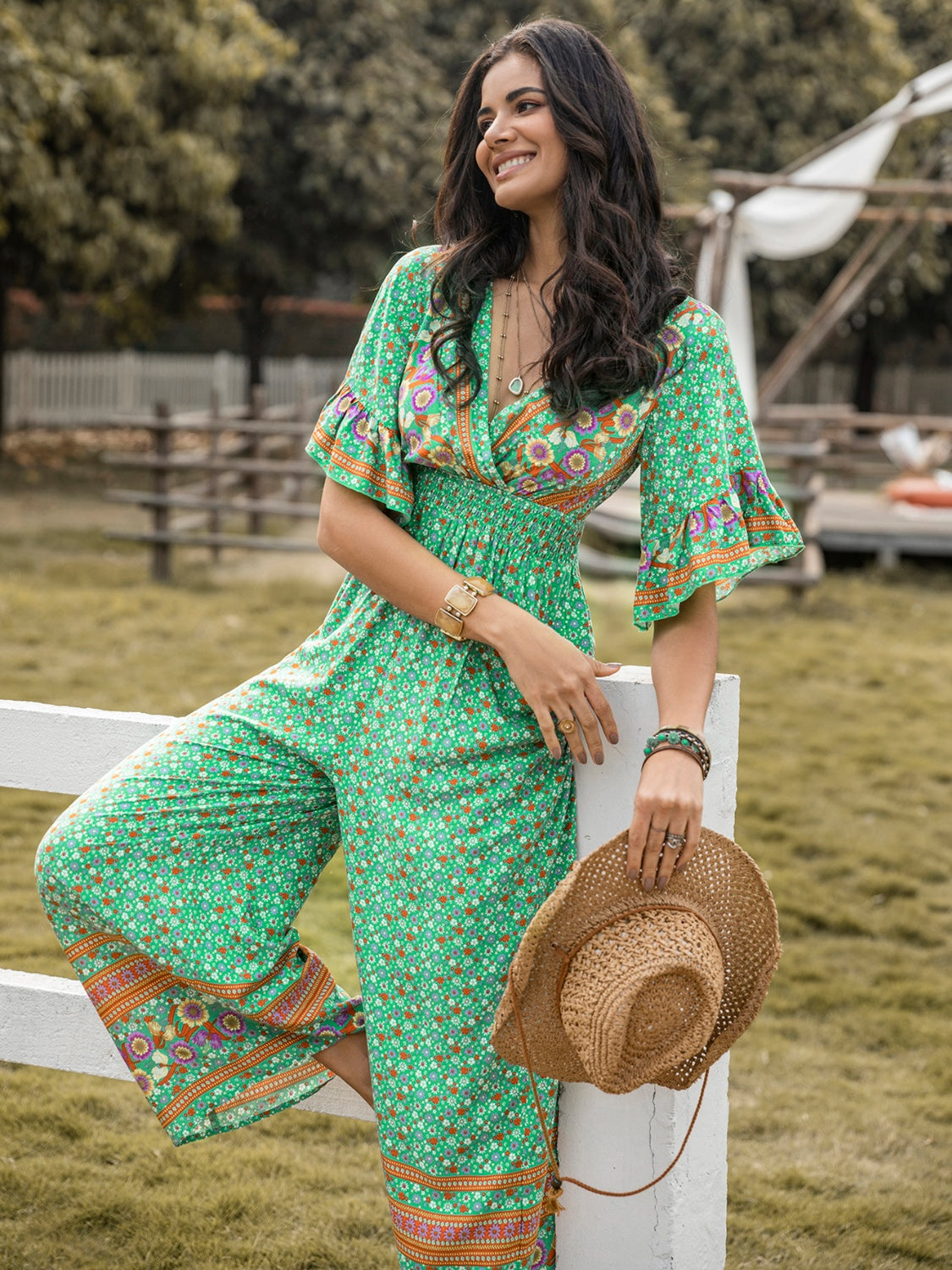 Honeybee Mumford's Floral Surplice Flutter Sleeve Jumpsuit