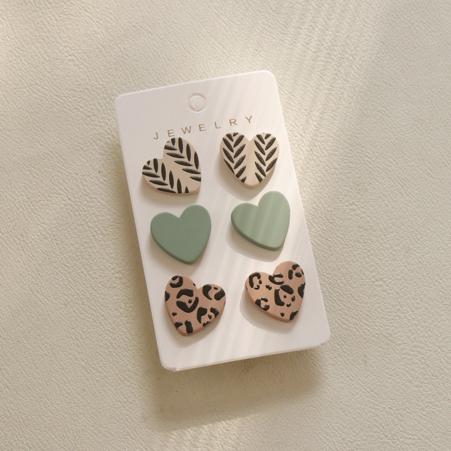 honeybee Mumford's 3 Piece Acrylic Heart Stud Earrings