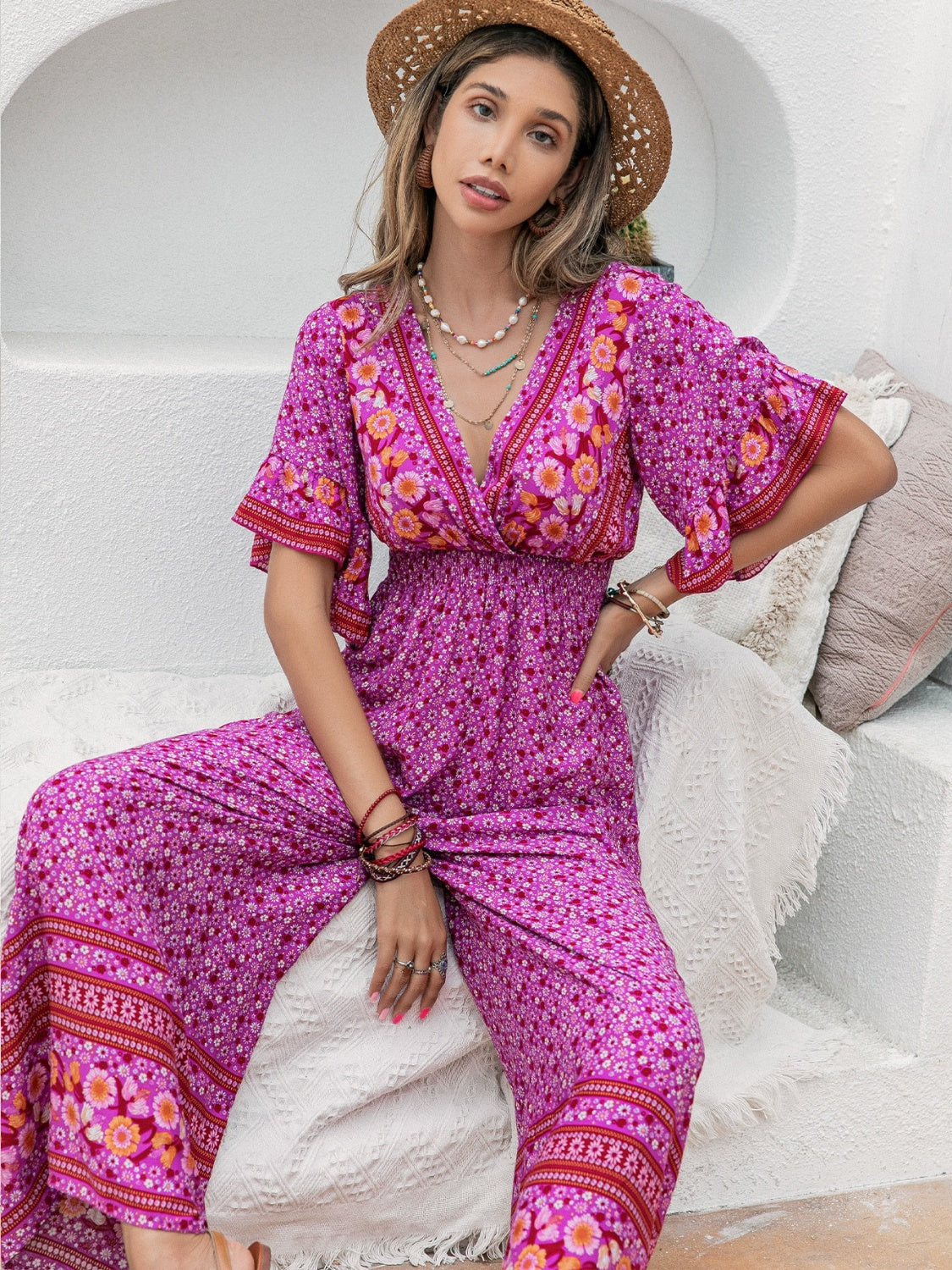 Honeybee Mumford's Floral Surplice Flutter Sleeve Jumpsuit