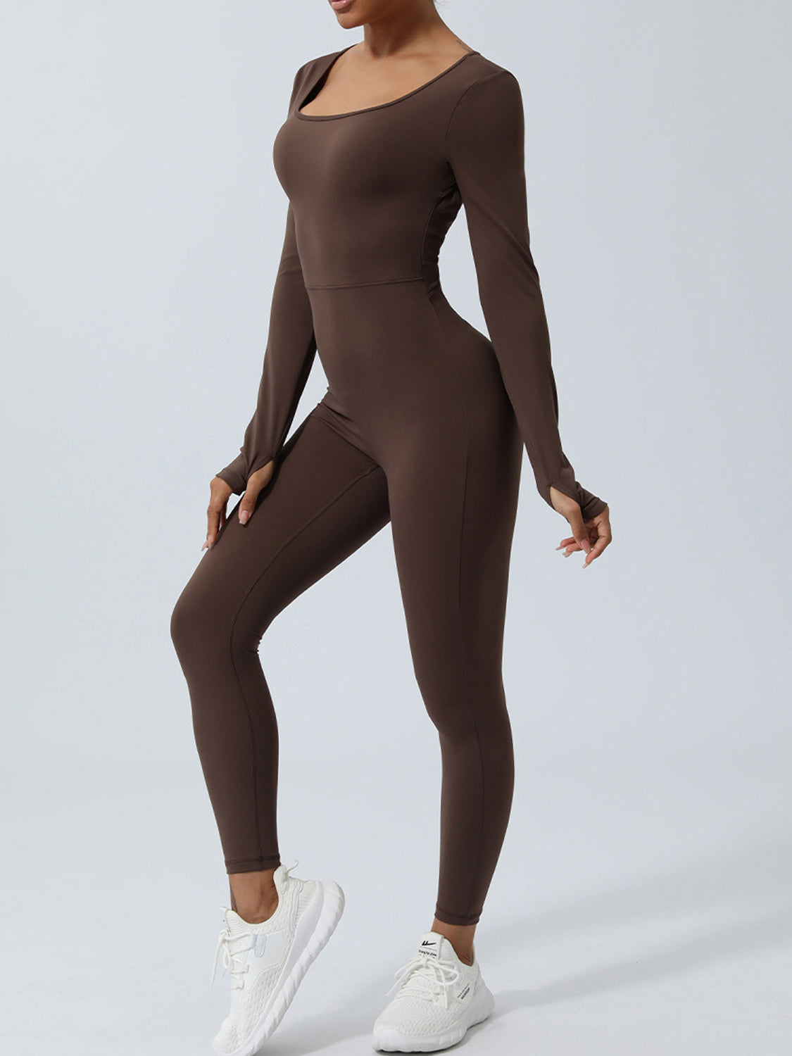 Honeybee Mumford's Twisted Backless Long Sleeve Jumpsuit