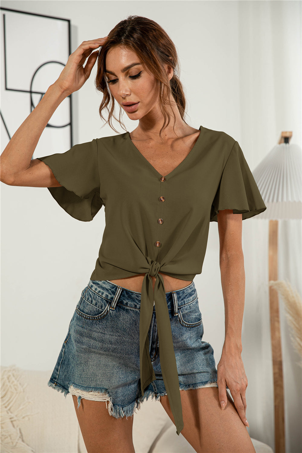 Honeybee Mumford's Decorative Button V-Neck Tied Blouse