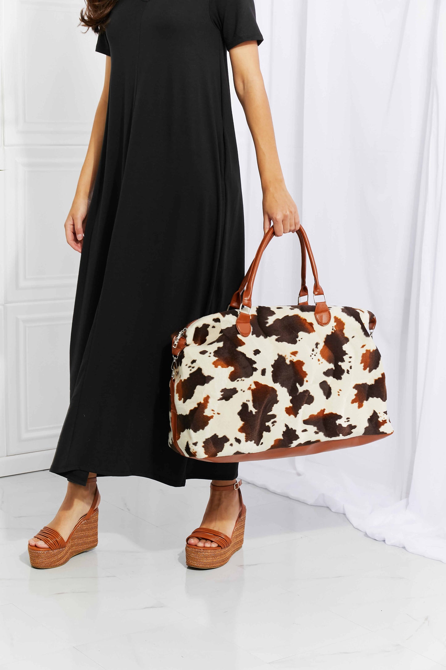 Honeybee Mumford's Cow Print Plush Weekender Bag