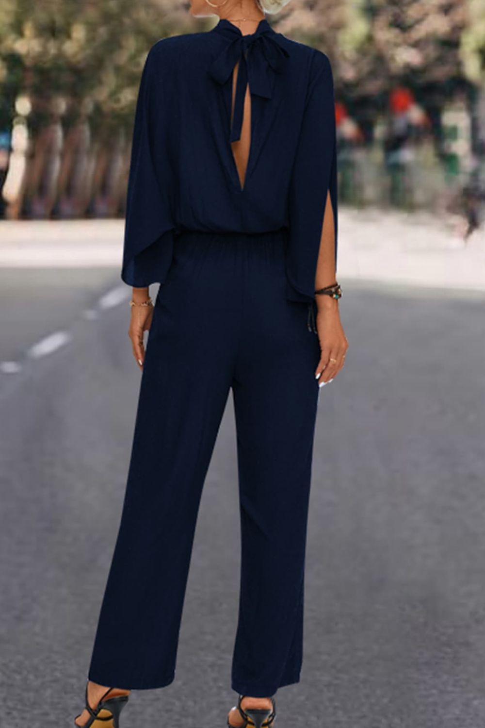 Honeybee Mumford's Tie Back Mock Neck Split Sleeve Jumpsuit