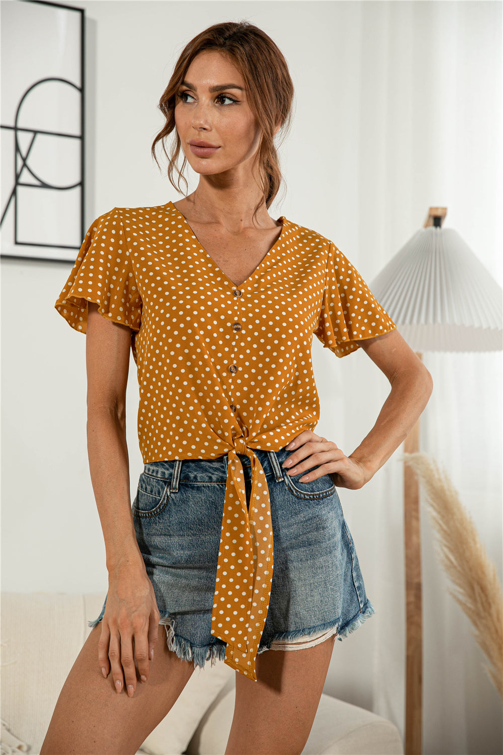 Honeybee Mumford's Decorative Button V-Neck Tied Blouse