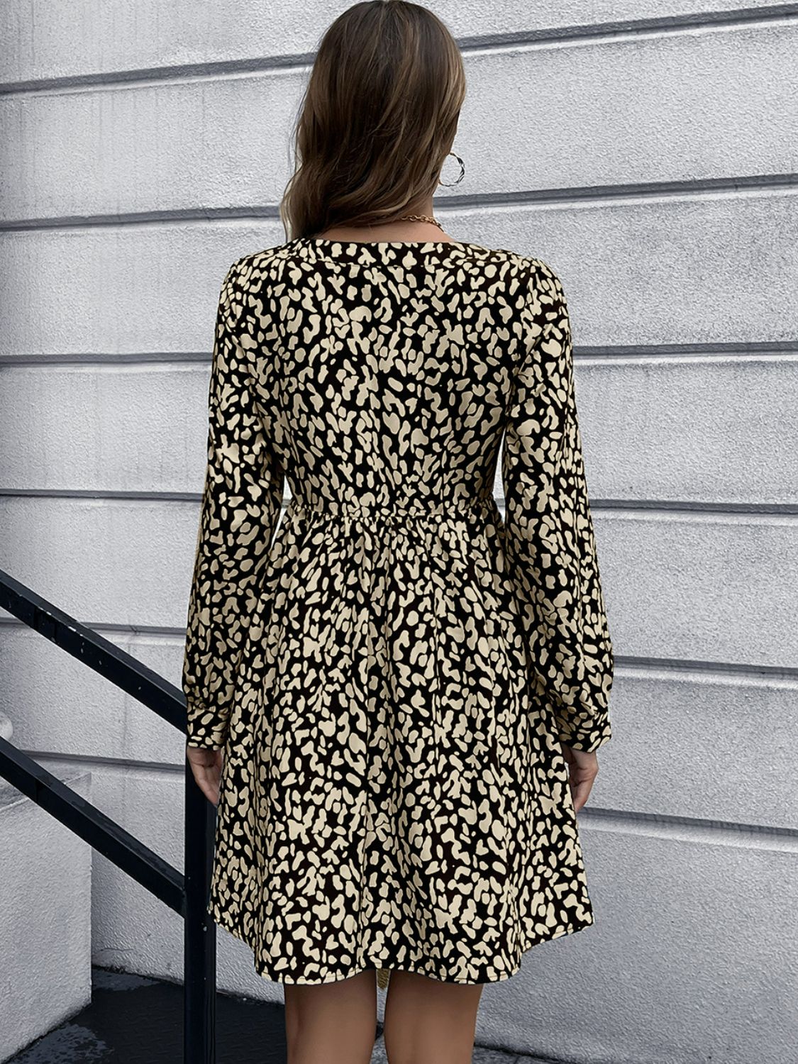 Honeybee Mumford's Animal Print Buttoned V-Neck Long Sleeve Dress