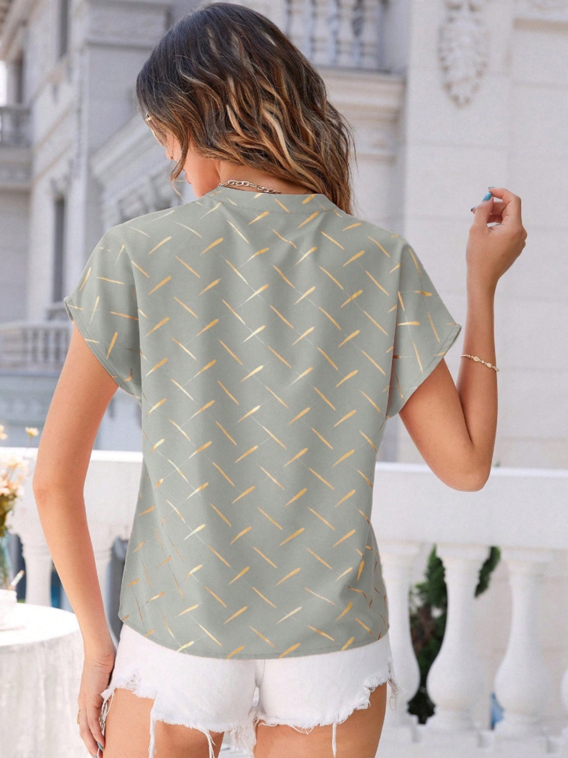 Honeybee Mumford's Printed Notched Short Sleeve Blouse