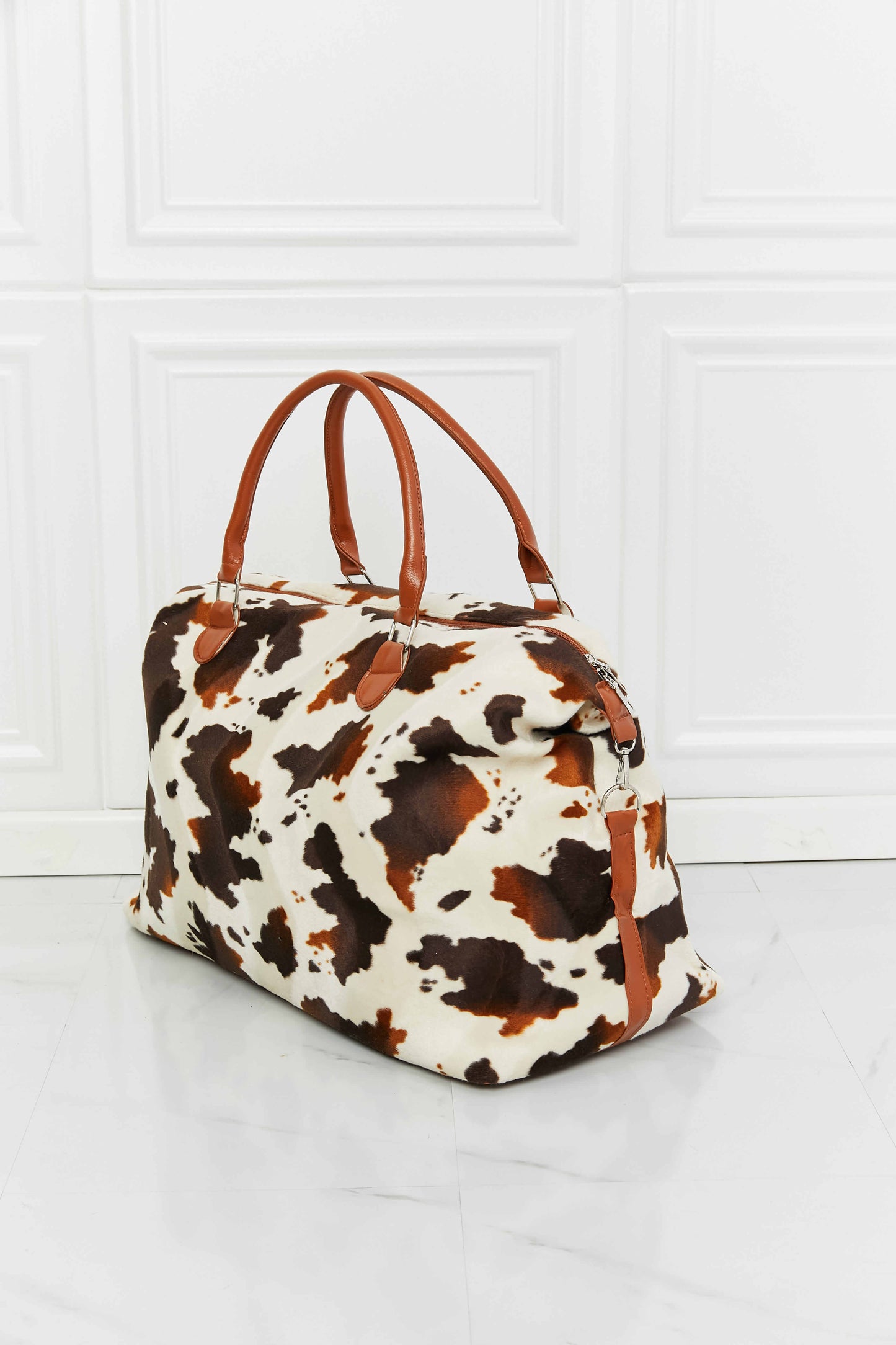 Honeybee Mumford's Cow Print Plush Weekender Bag