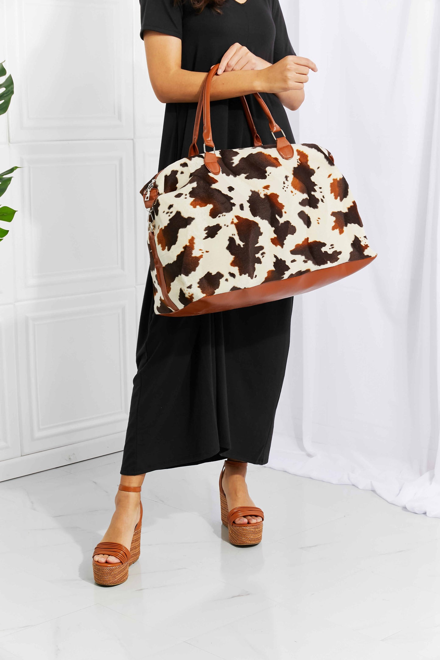 Honeybee Mumford's Cow Print Plush Weekender Bag