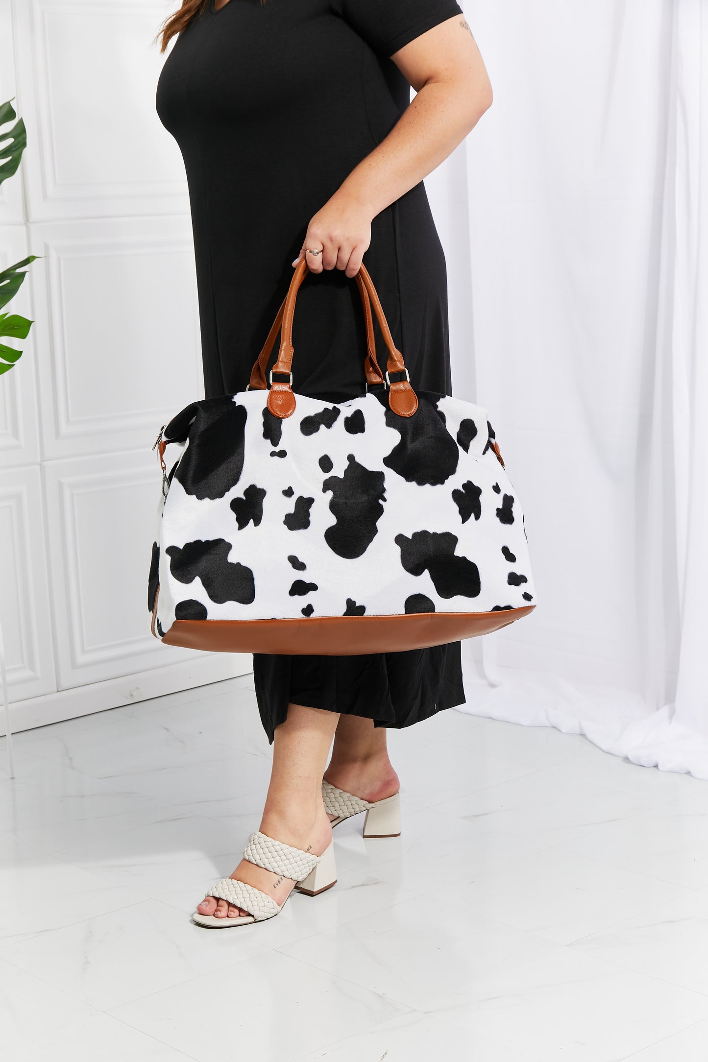 Honeybee Mumford's Cow Print Plush Weekender Bag