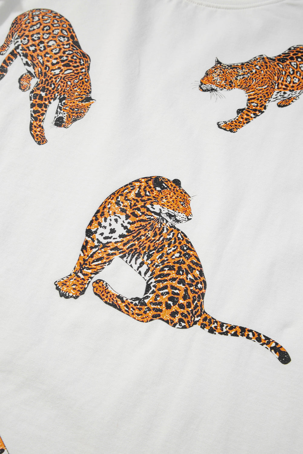 Honeybee Mumford's White Leopard Print Drop Shoulder Casual T Shirt