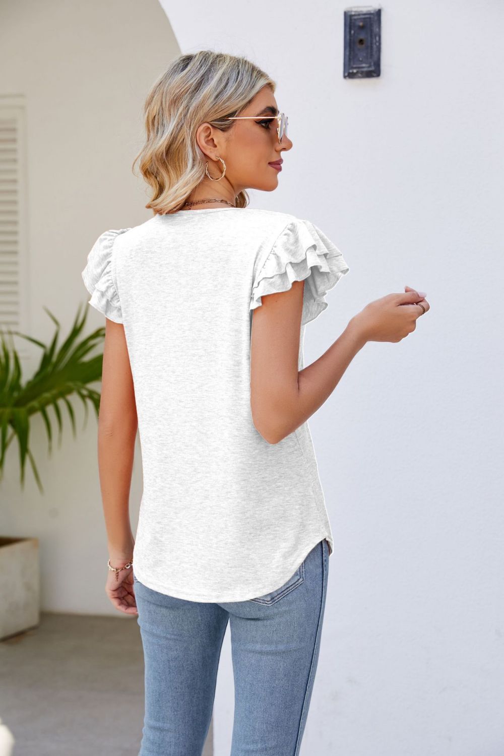 Honeybee Mumford's Smocked Flutter Sleeve V-Neck Top