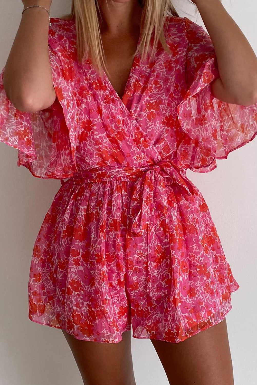 Honeybee Mumford's Pink V Neck Ruffled Sleeve Floral Romper