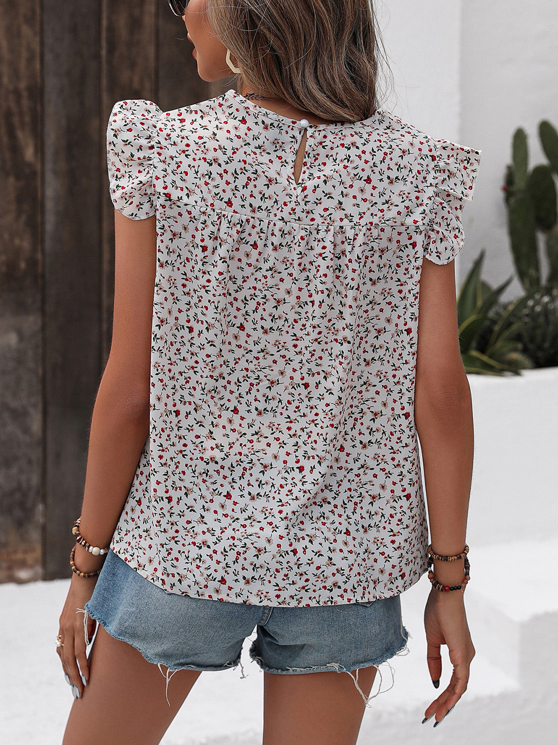 Honeybee Mumford's Ruffled Printed Round Neck Cap Sleeve Blouse