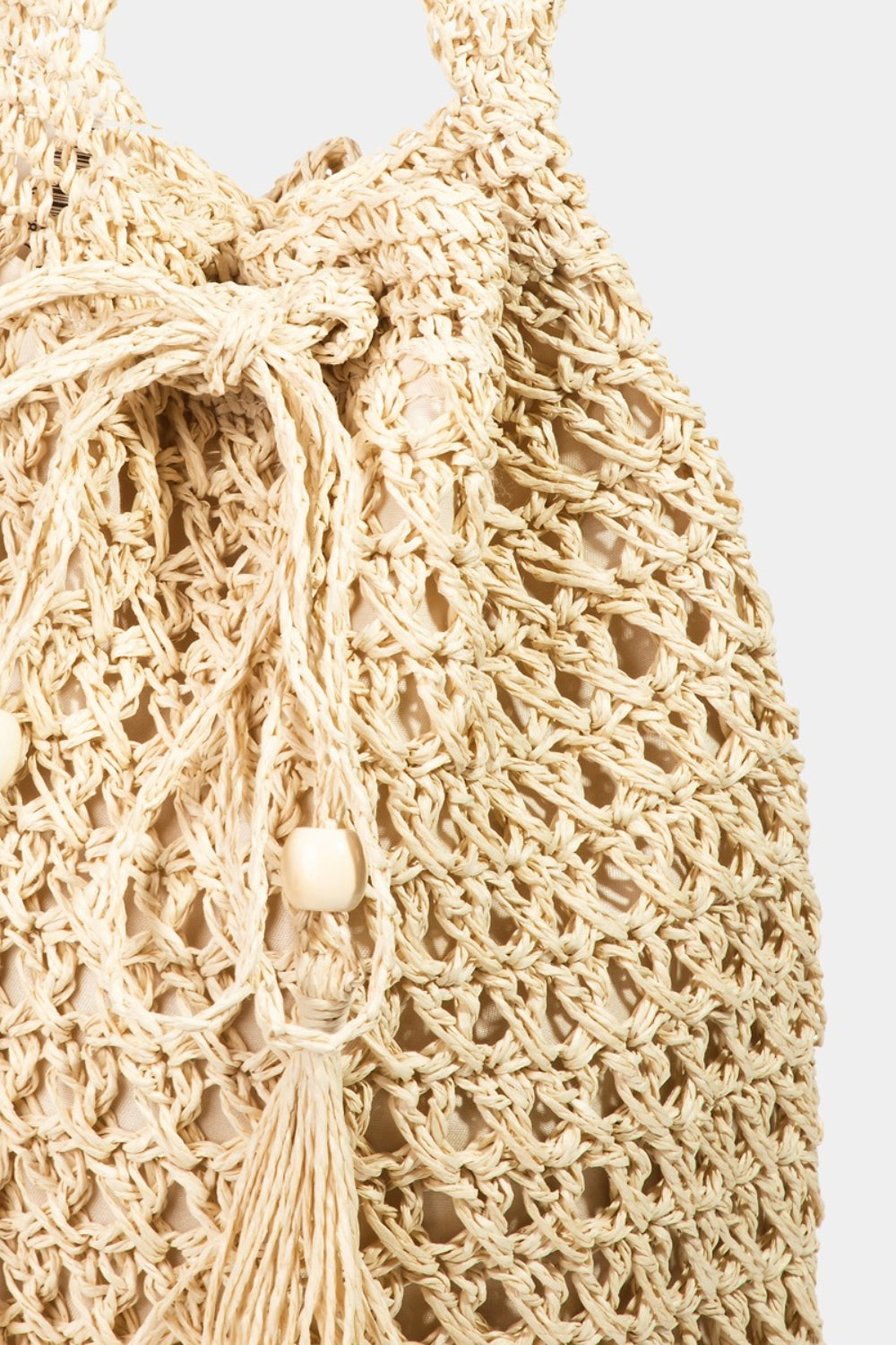 Honeybee Mumford's Straw Braided Drawstring Tote Bag with Tassel