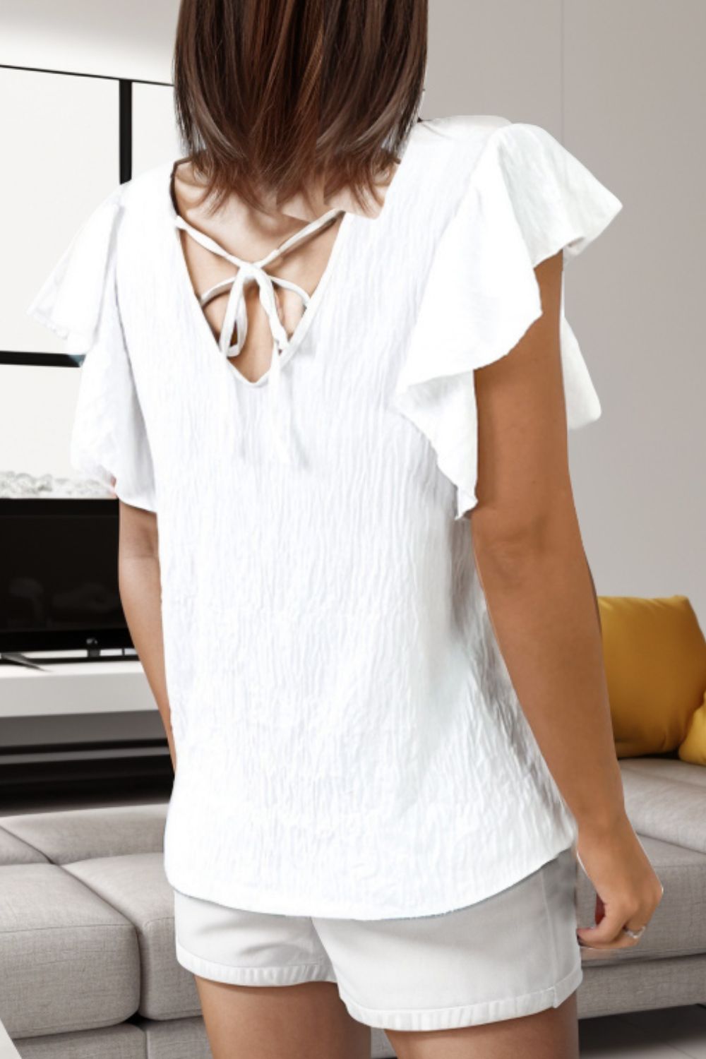 Honeybee Mumford's Tied V-Neck Ruffled Cap Sleeve Blouse