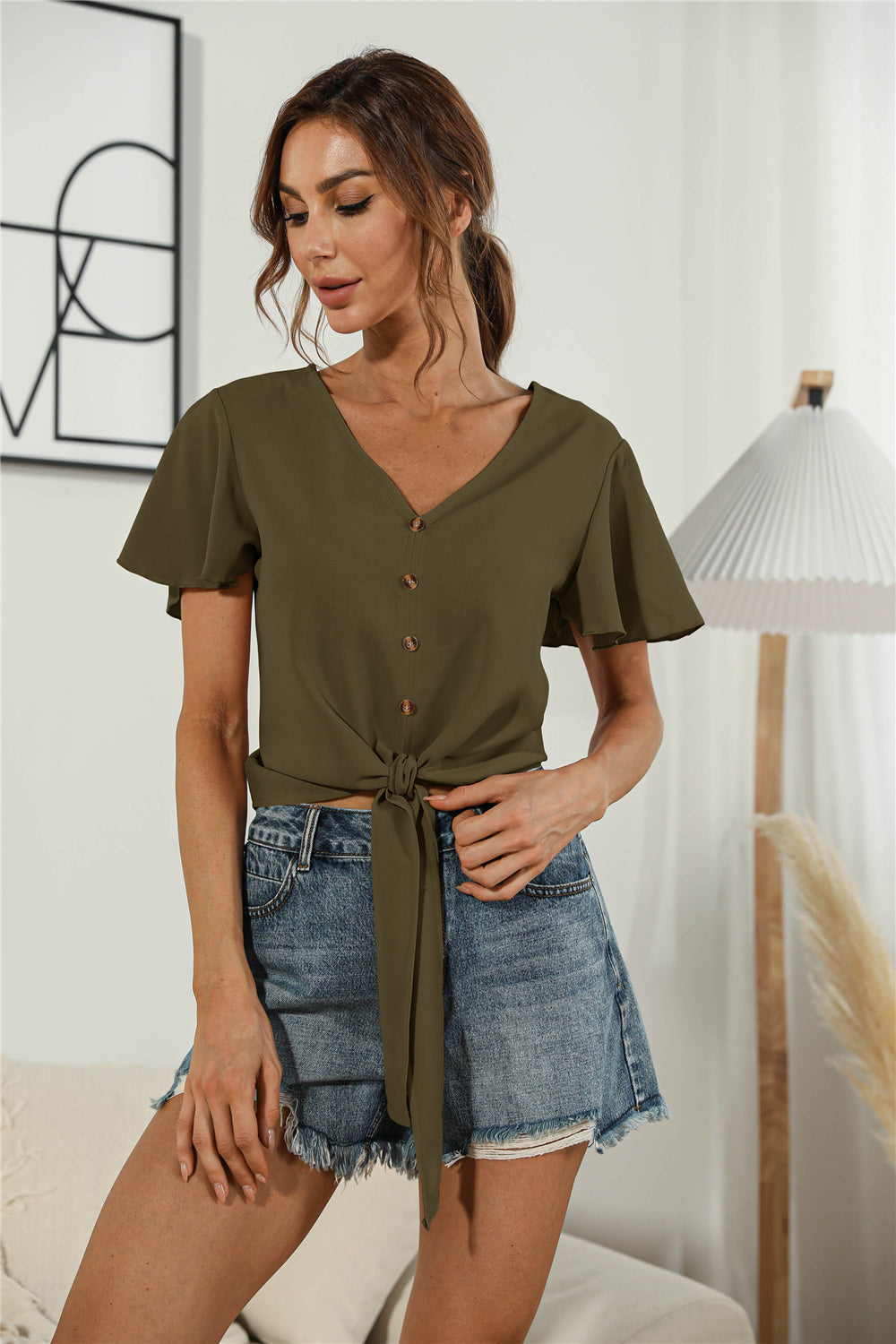 Honeybee Mumford's Decorative Button V-Neck Tied Blouse