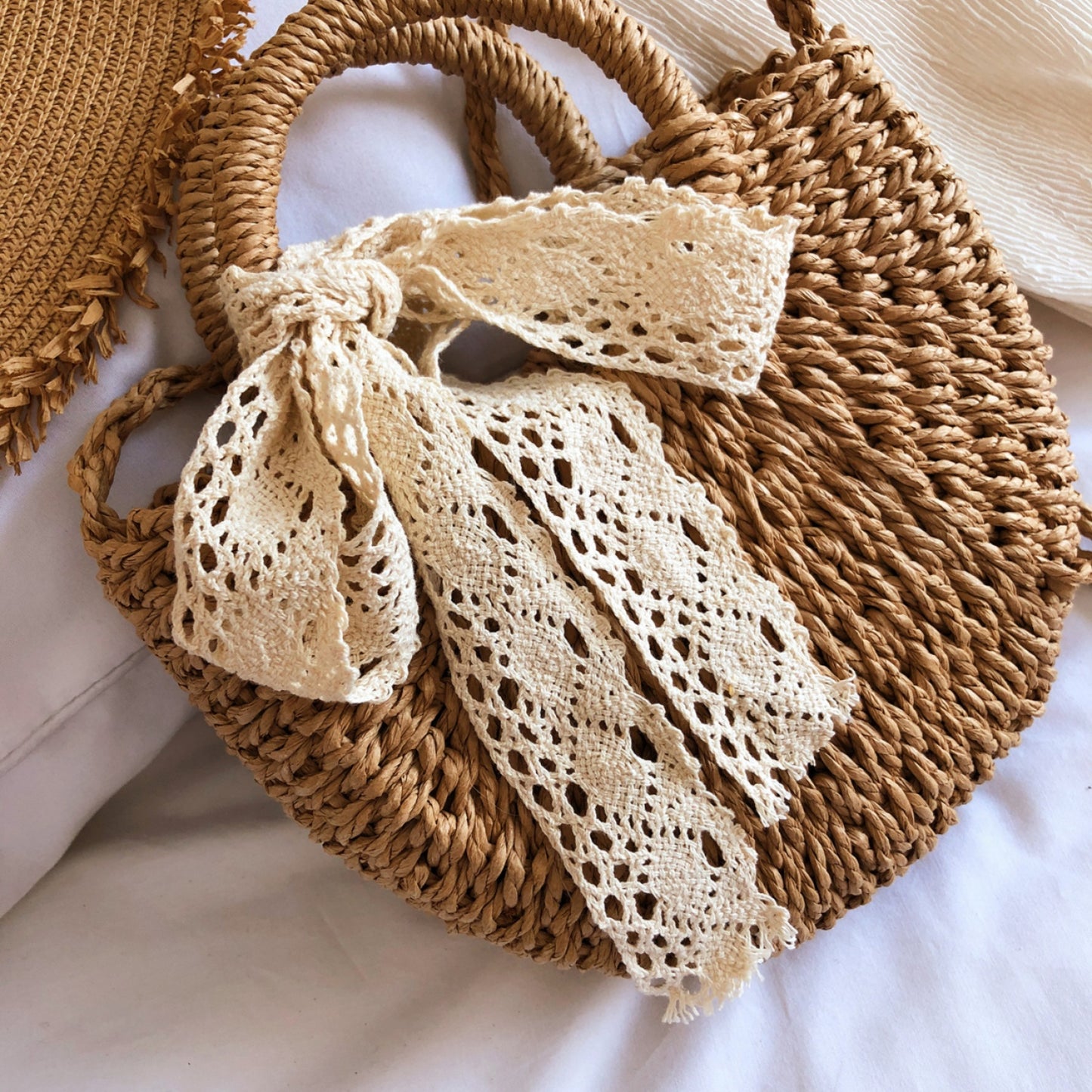 Honeybee Mumford's Drawstring Straw Braided Crossbody Bag