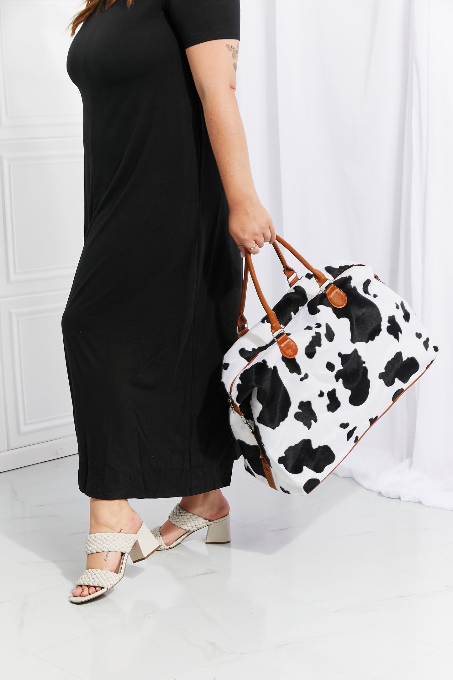 Honeybee Mumford's Cow Print Plush Weekender Bag