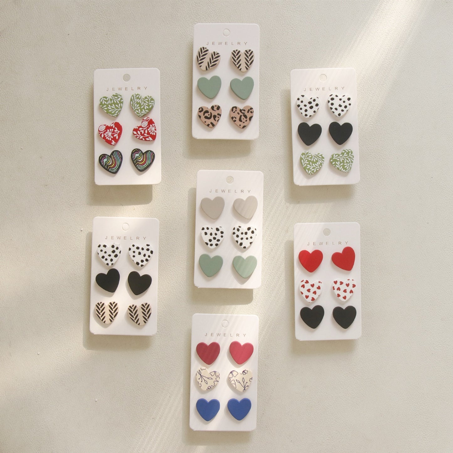 honeybee Mumford's 3 Piece Acrylic Heart Stud Earrings