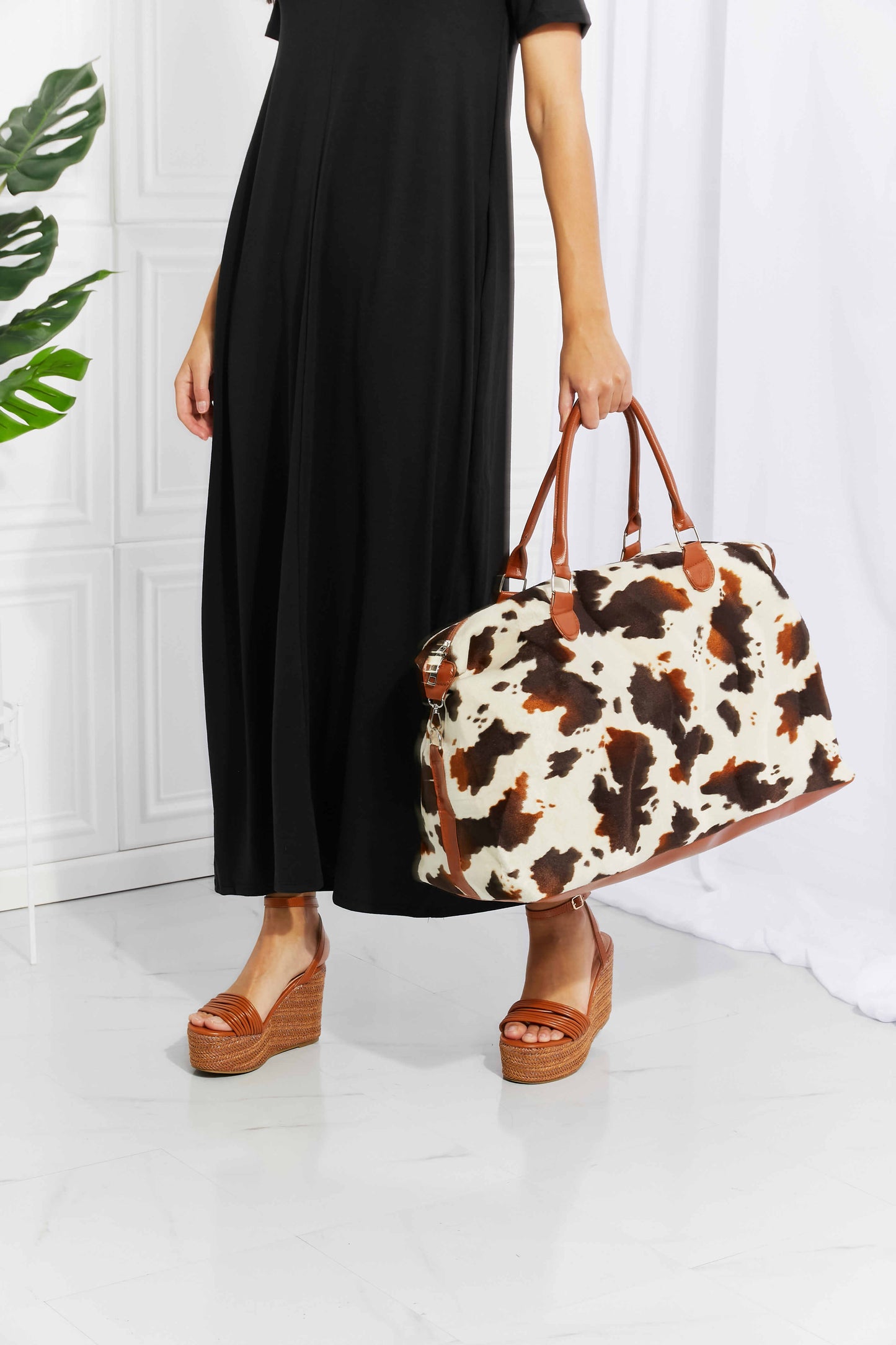 Honeybee Mumford's Cow Print Plush Weekender Bag