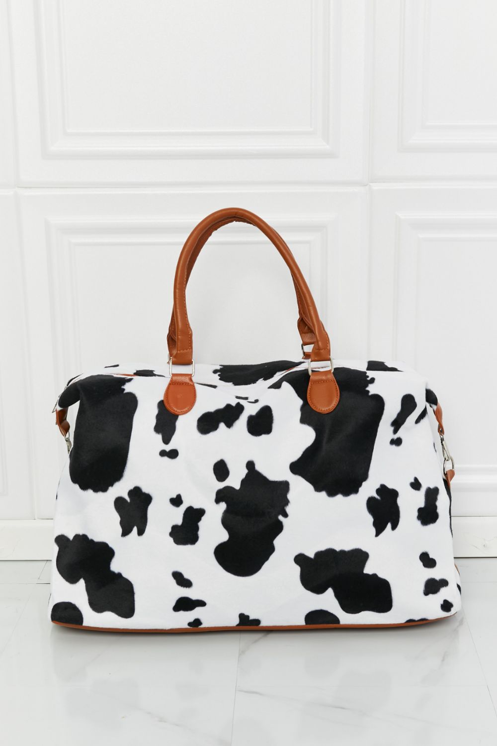 Honeybee Mumford's Cow Print Plush Weekender Bag