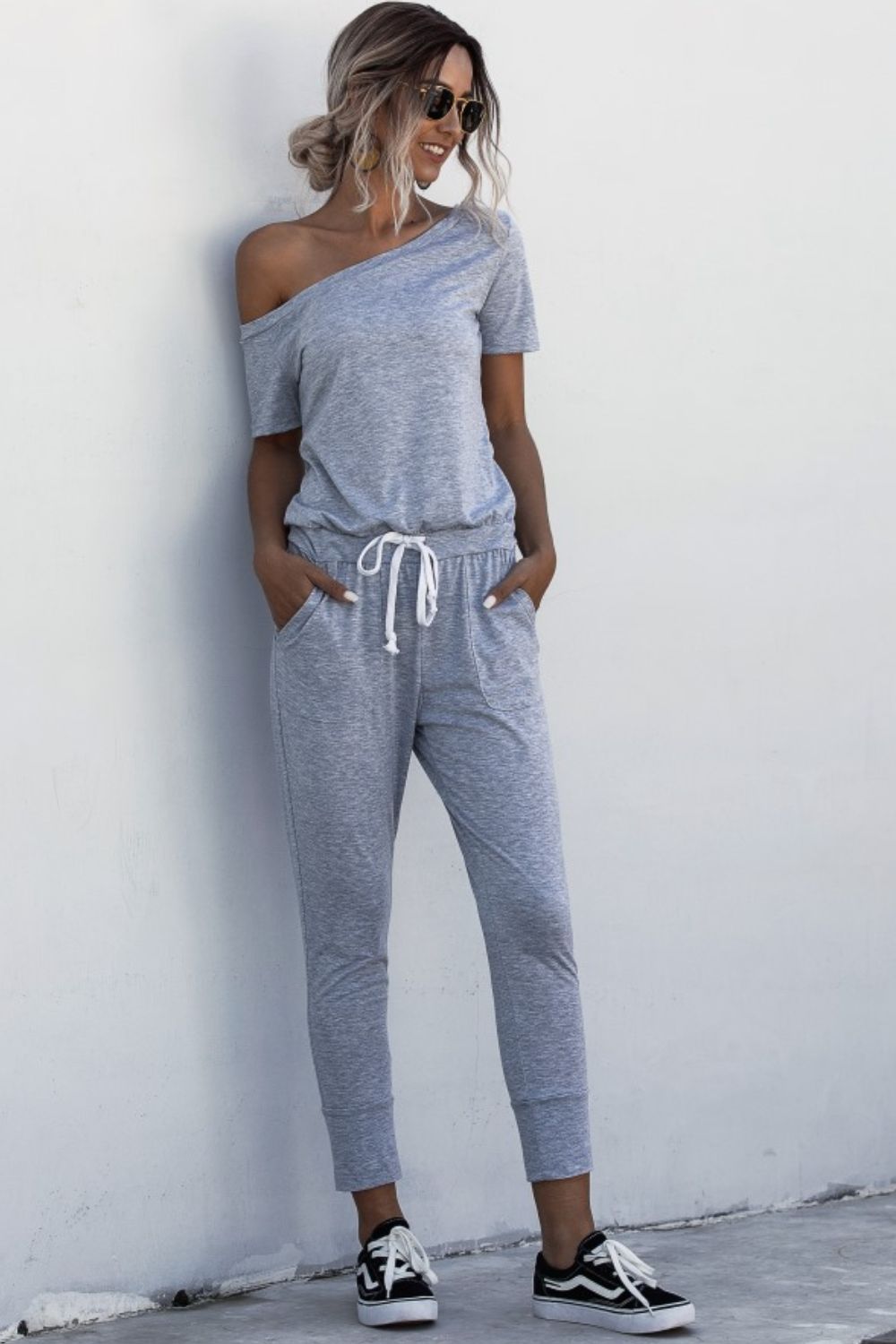 Honeybee Mumford's Asymmetrical Neck Tied Jumpsuit with Pockets (Cloudy Blue, Black, Forest green, Wine red colors)