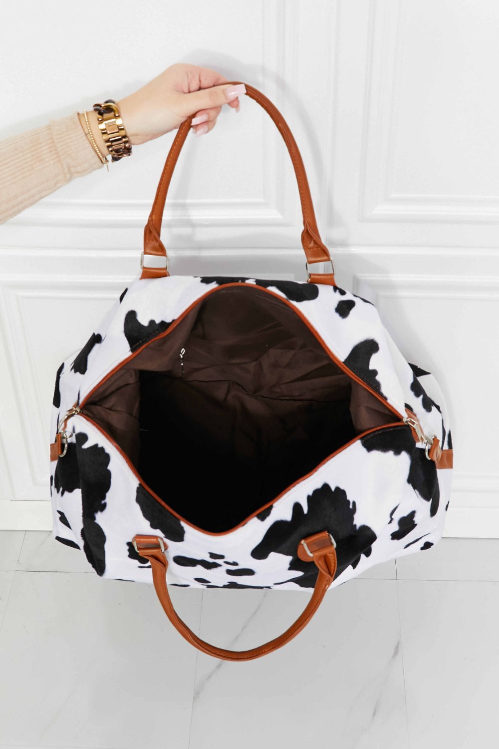 Honeybee Mumford's Cow Print Plush Weekender Bag