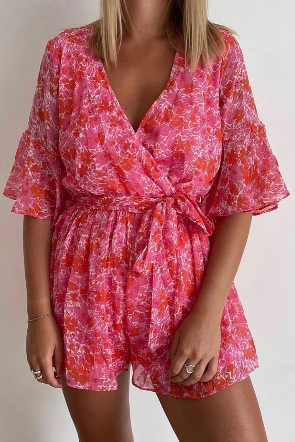 Honeybee Mumford's Pink V Neck Ruffled Sleeve Floral Romper