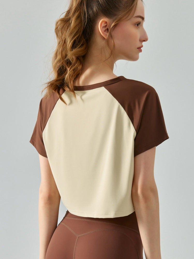 Honeybee Mumford's Round Neck Raglan Sleeve Cropped Sports Top