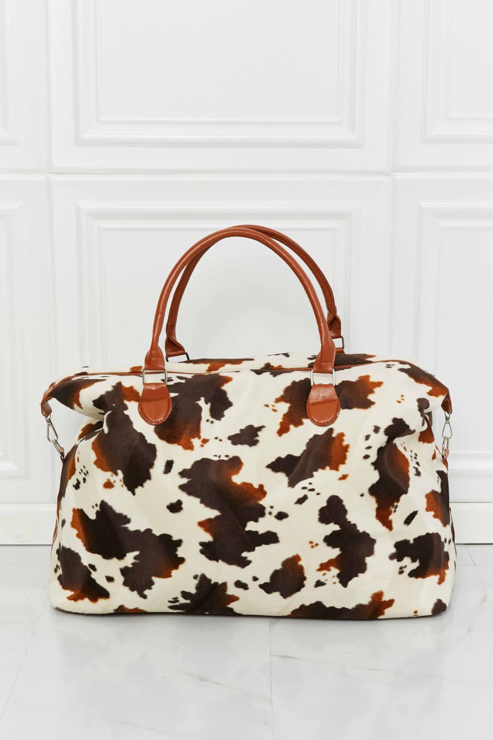 Honeybee Mumford's Cow Print Plush Weekender Bag