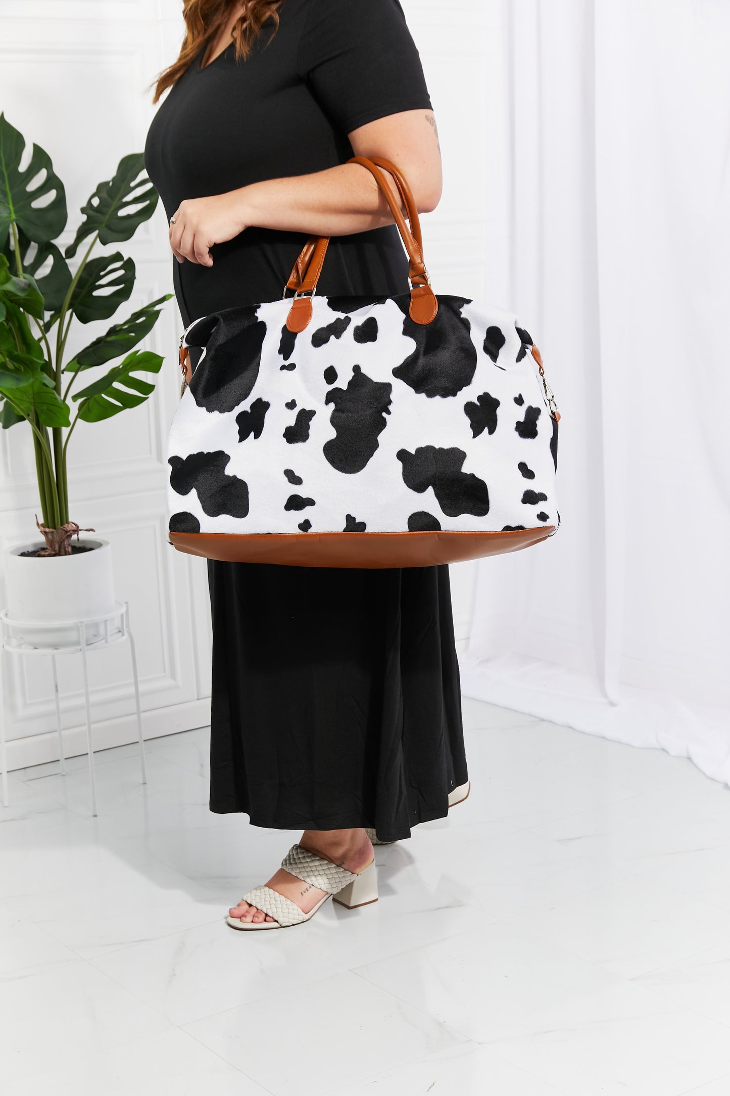 Honeybee Mumford's Cow Print Plush Weekender Bag