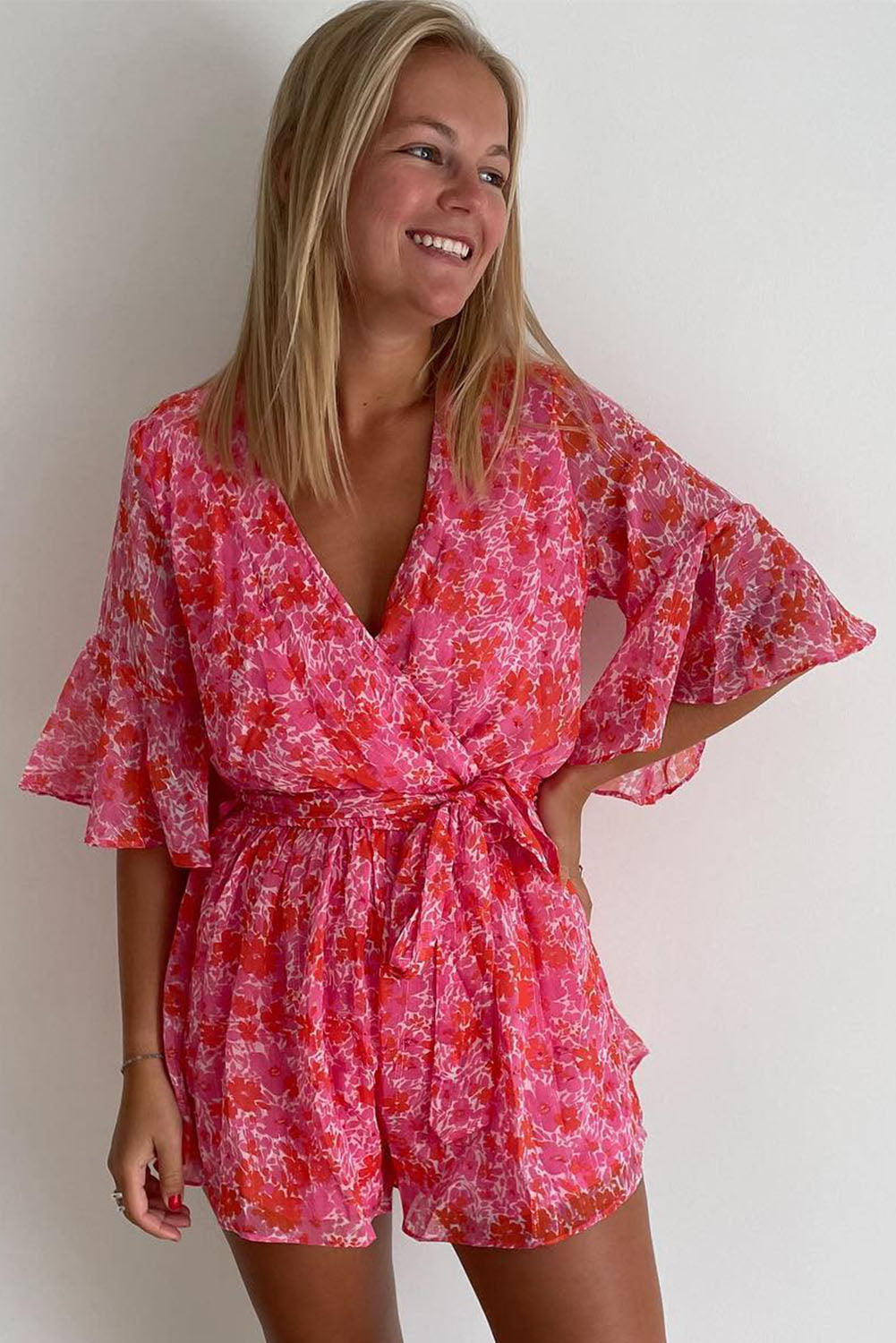 Honeybee Mumford's Pink V Neck Ruffled Sleeve Floral Romper